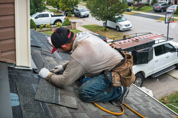 Professional Gutter Repair And Installation technician working in Rosedale, WA